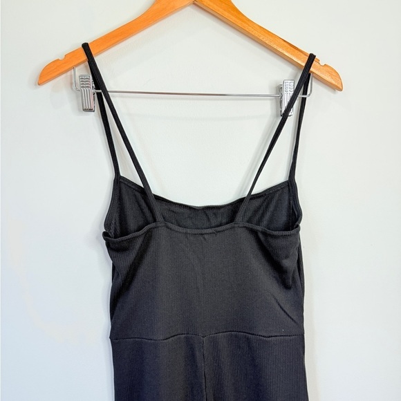 PrettyLittleThing Black Ribbed Strappy Square Neck Flared Jumpsuit - Picture 6 of 9